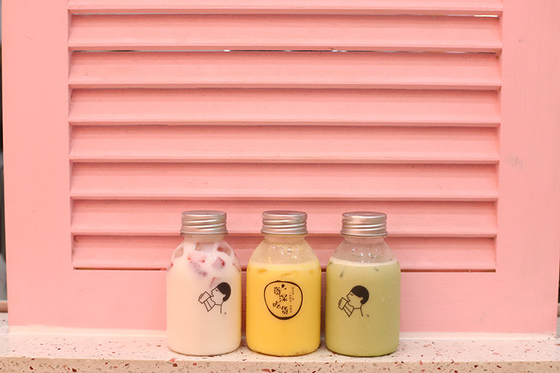 Botol Teh Susu Plastik dengan Genggam untuk Minum dengan Bahan dan Efisiensi