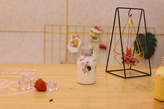 Botol Teh Susu Plastik dengan Genggam untuk Minum dengan Bahan dan Efisiensi