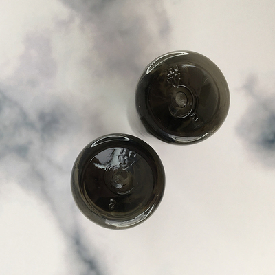Botol cair dengan tutup sekrup transparan dengan cetakan logo khusus