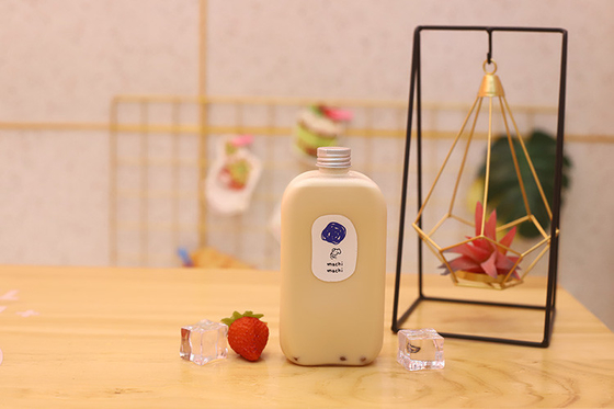 Tangani Botol Teh Susu Rakan Utama Untuk Minuman Berukuran Sedeng